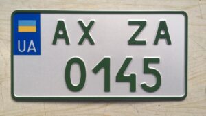 зелений номер на електромобіль американський розмір